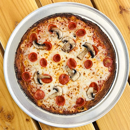 A classic pizza from Pueblo Pizza at Eddie's Food & Drink in San Luis.